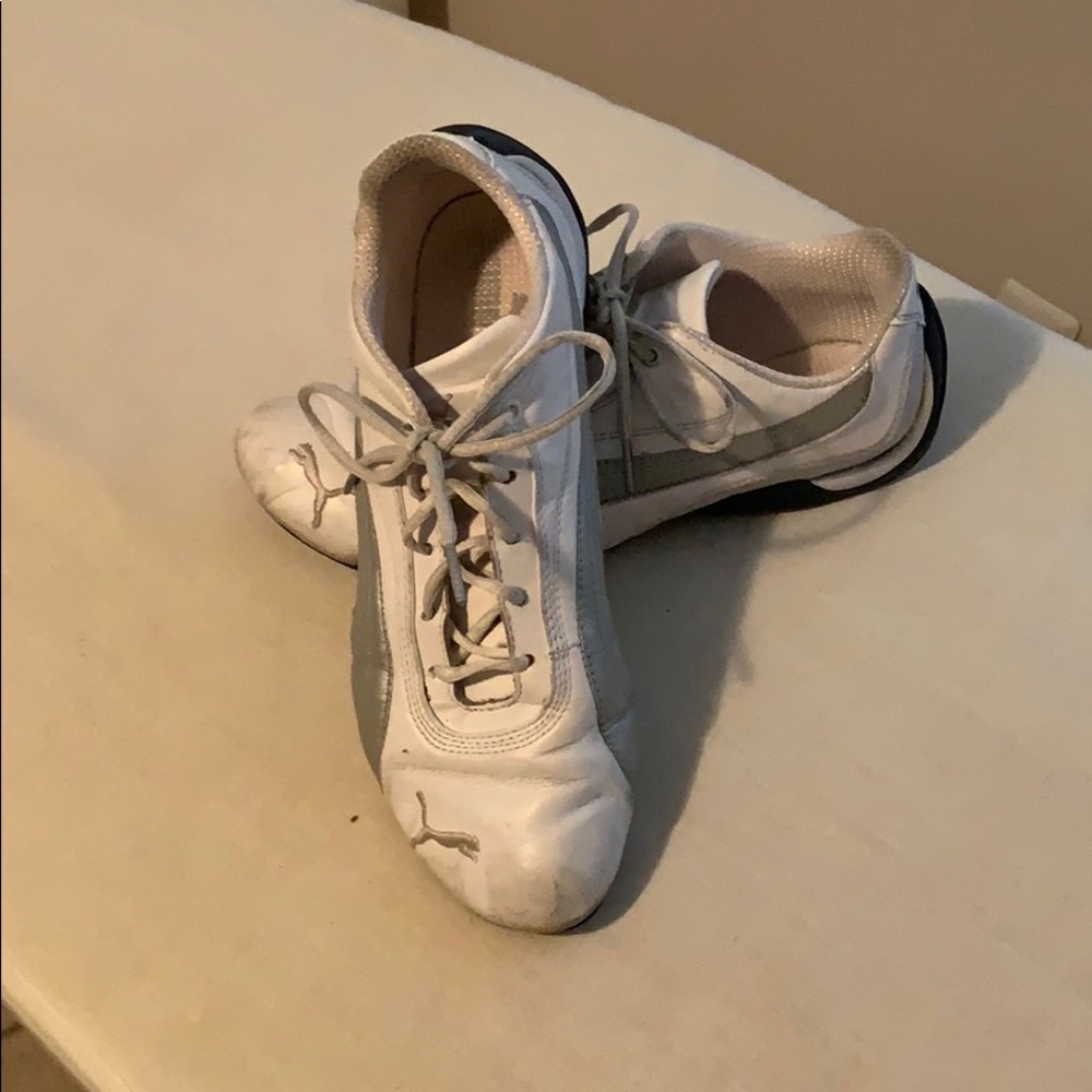 White and Gray PUMA tennis shoes